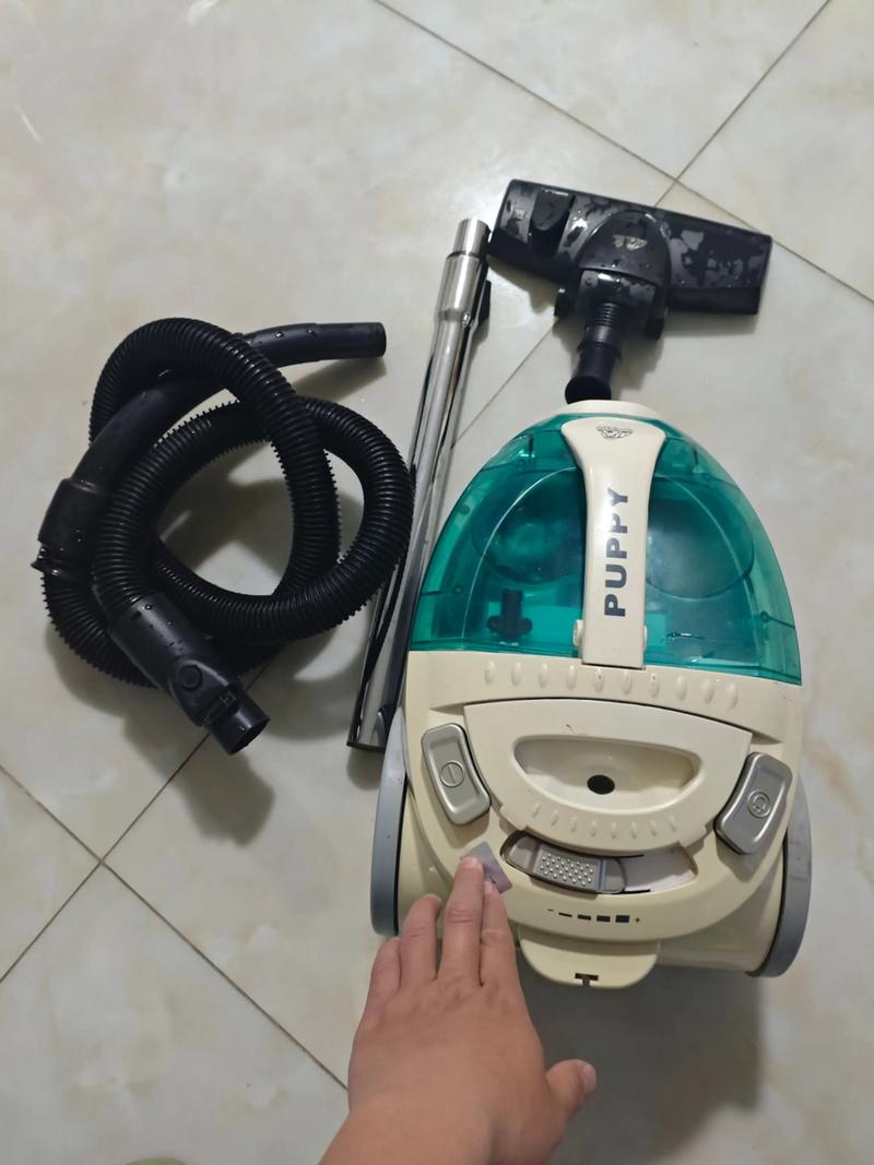 小狗吸尘器吸尘盒怎么拆