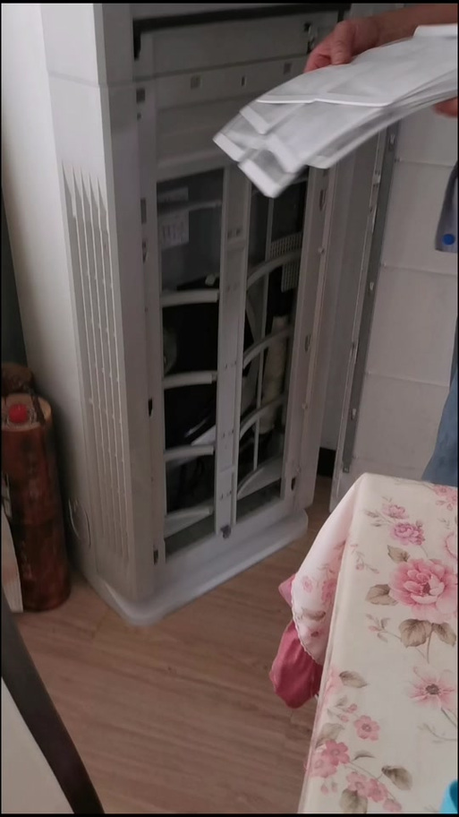 T悦柜机前盖怎么打开